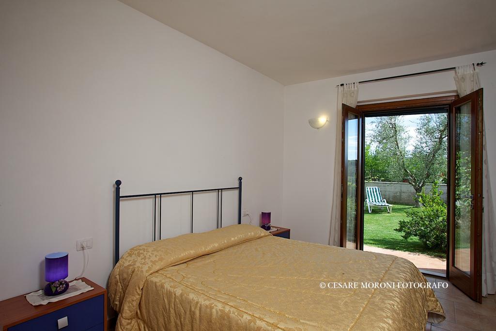 Residence Ai Campi Da Golf Saturnia Rum bild