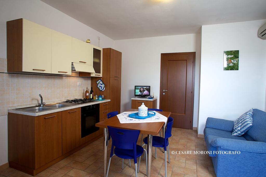 Residence Ai Campi Da Golf Saturnia Rum bild